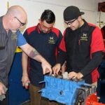 Students learning engine diagnostics at PCC