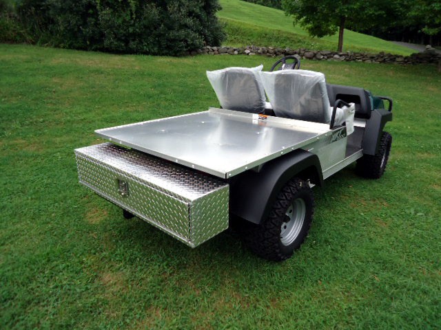 Close-up of a Club Car CA series tool box latch, highlighting its stainless steel construction and secure locking mechanism