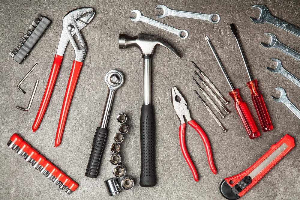 Essential socket set including ratchet, sockets, extension bar and hex keys, key components of a car tool kit for various repair needs.