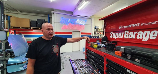 Mechanic Paulie from Super Garage unboxing new tools at Supercheap Auto Penrith Superstore